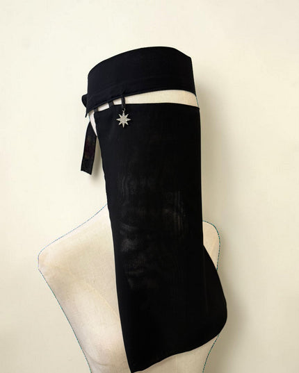 Awra.at black chiffon niqab with a star charm, made from 100% polyester.